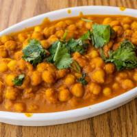 Channa Masala · Vegan. Whole garbanzo beans in a zesty tomato cilantro curry.
