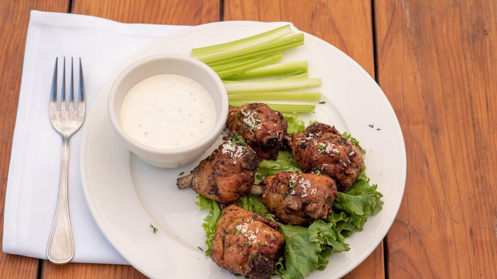 Chicken Drumettes · spiced drumettes. tossed in a chili and garlic parmesan glaze,. served with ranch dressing