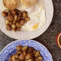 Biscuits, Eggs & Country Gravy · Two of terry's biscuits, two eggs, creamy country gravy, potatoes.