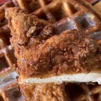 Fried Chicken & Waffle · Buttermilk waffle, herb fried chicken breast, maple syrup sweet, yes! Savory, perfection!