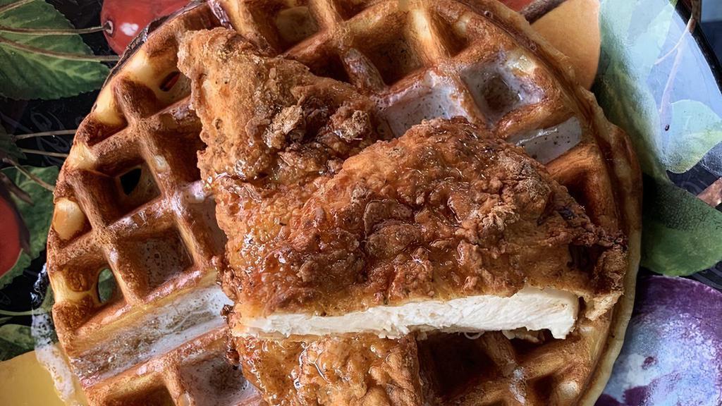 Fried Chicken & Waffle · Buttermilk waffle, herb fried chicken breast, maple syrup sweet, yes! Savory, perfection!