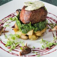 Grilled Filet Mignon (10 oz) · Roasted yukon potatoes, sauteed spinach, compound butter, vincotto reduction.