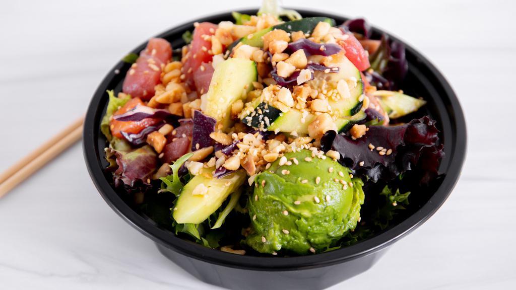 Super Keto Power · Salmon, tuna, cucumbers, fresh ginger, purple cabbage mixed in wasabi shoyu with avocado topped with toasted sesame macadamia nuts