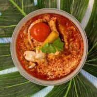 Tom Yum · spicy & sour soup, lemongrass, galangal, kaffir lime leaf, mushroom & tomatoes