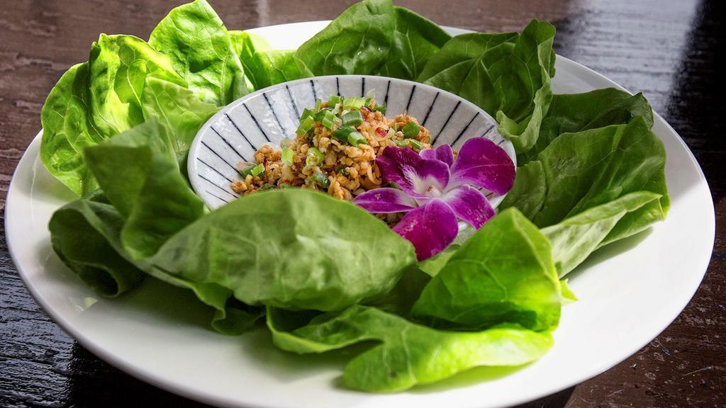 Chicken Lettuce Wrap · Wok-fried minced chicken with lava sauce red onion, cilantro, mint, lemongrass, served with butter lettuce