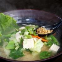 VEGETABLE NOODLE · Fresh tofu, mixed vegetables, fried garlic, cilantro in vegetarian broth.