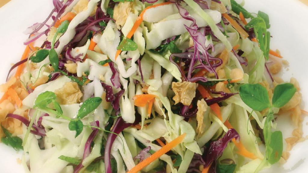SL1. Heavenly Salad · Shredded cabbage, fresh herbs, organic carrot and tofu, mixed in light vinaigrette and nuts.