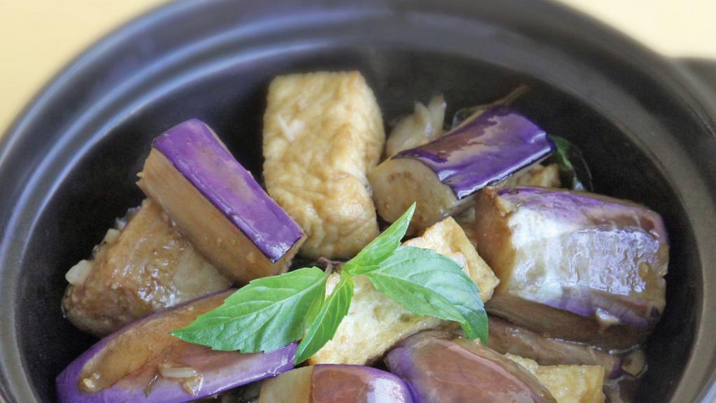 E1. Eggplant Tofu · Eggplant and fresh tofu sauteed with basil and House Special sauce.