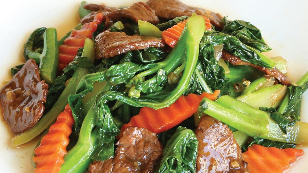 E3. Chinese Broccoli Delight · Chinese broccoli sauteed with Teriyaki marinated soy protein.