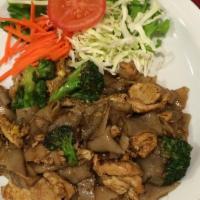 Pad See-Ew · Choice of meat, flat noodles, carrots, broccoli and egg.