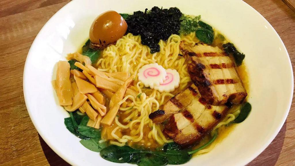 02. Miso Ramen
 · Roasted pork, boiled egg, bamboo shoots, fish cake, onion, seaweed.