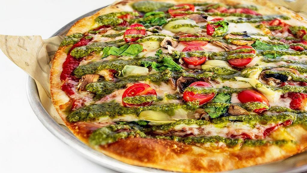Veggie Pesto Pizza (Vegetarian Friendly) · House-Made Red Sauce, Mozzarella, Artichokes, Mushroom, Spinach, Grape Tomatoes. Finished with Pesto.