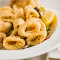 Calamari Fritti · Local deep fried calamari served with spicy aioli sauce.