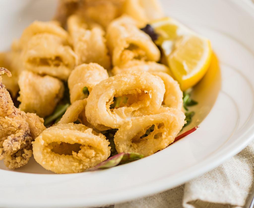 Calamari Fritti · Local deep fried calamari served with spicy aioli sauce.