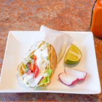 Super Taco · Melted cheese, beans, guacamole sour cream and a choice of meat (extra charge for shrimp or ...