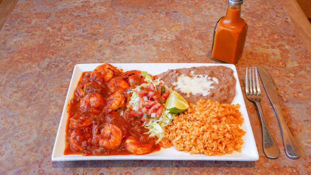 Camaron (Shrimp) · Served with rice and beans.