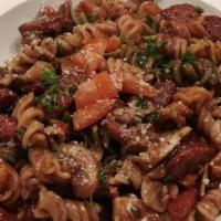 Fusilli · Tri-colored Fusilli with sautéed Italian sausage, mushroom, olives and tomato on red wine sa...