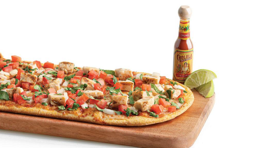 Street Taco Flatbread · Taco Sauce and Seasoning, Mozzarella Cheese, All-Natural Grilled Chicken, and Fresh Pico De Gallo. Comes with a Complimentary Side of Lime and Cholula Hot Sauce.