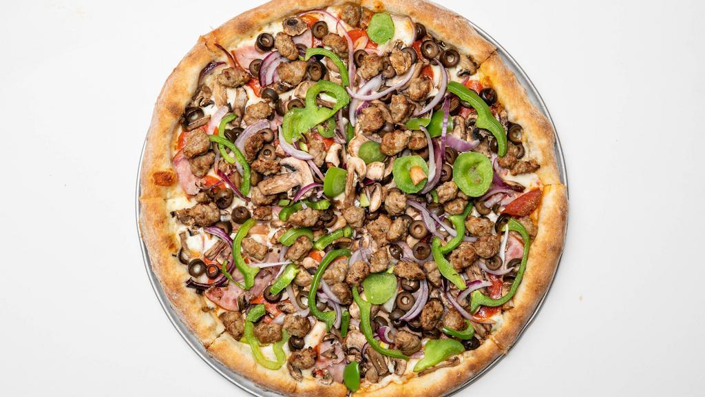 Combination · Loaded with pepperoni, Canadian bacon, sausage, green bell peppers, red onions, black olives and mushrooms.