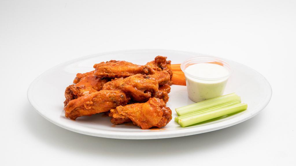 Chicken Wings · Crispy chicken drumettes, bone-in or boneless. Served dry, teriyaki, or buffalo style with carrots and celery. Ranch or Bleu cheese for dipping.