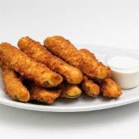 Fried Zucchini · Basket of deep fried zucchini strips served with ranch.