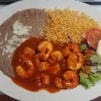 Camarones a la Diabla · Shrimp in hot sauce. Served with rice and beans.