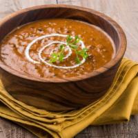 Dal Makhani · Creamy lentil stew prepared with garlic, tomatoes and fresh spices.