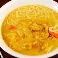 Curry Chicken Vermicelli · Tender chicken breast in spicy coconut milk curry broth.