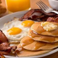 The Slims Breakfast · Combo with one pancake, one egg, two bacon strips or two sausage links.