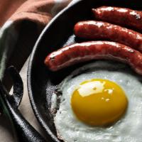 Sausage & Eggs Breakfast · Customer's choice of eggs preparation with sizzling sausage and side of toast and hash browns.