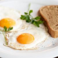 Two Eggs Breakfast · Customer's choice of eggs preparation with side of toast and hash browns.