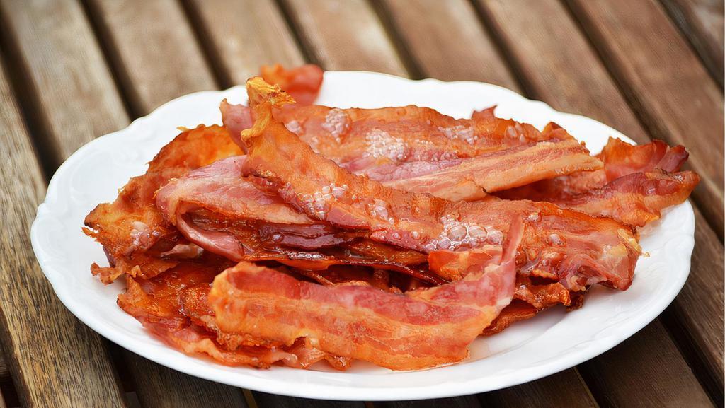 Side of Bacon Strips · Crispy bacon strips.