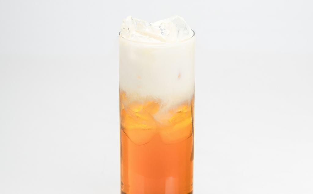 Liquid Gold · Handcrafted honey oolong tea topped with cream. Lactose-free. Contains dairy.