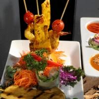 Tha Siam Appetizer Sampler (Appetizer) · Prawn satay two pieces, chicken satay two pieces, dumpling four pieces, and veg. Fresh roll ...