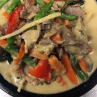 25. Kang Keaw Wan (Green Curry) · Spicy green curry with eggplant, carrot, string bean, bell pepper, bamboo shoot in coconut m...
