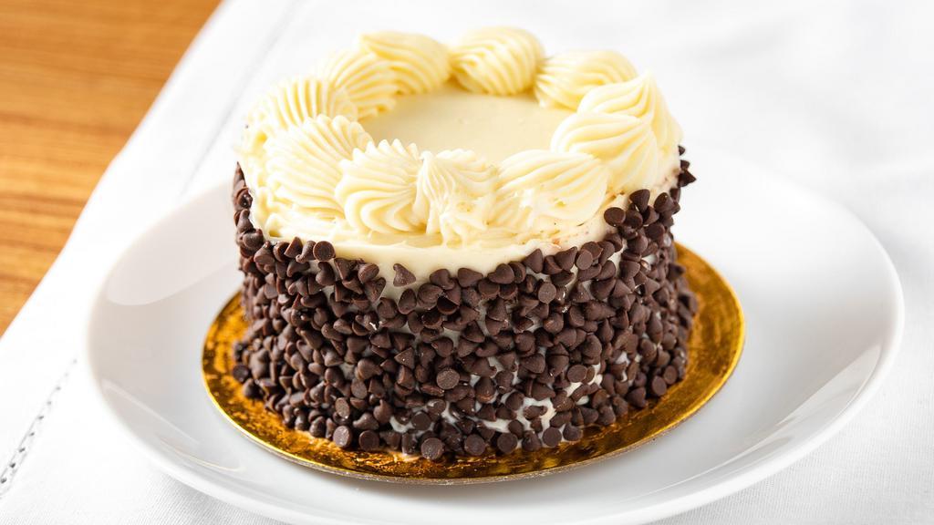 Black Bottom Cake · One of our most popular items! Bottom layer of melted chocolate chips, then moist, rich, chocolate cake, followed by a thin layer of cheesecake, all covered in cream cheese frosting!