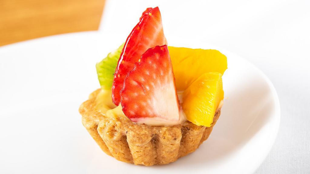 Fresh Fruit Tartlette · Bite-sized tart shell filled with pastry cream and topped with fresh fruit.