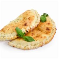 Mozzarella, Ricotta & Spinach Calzone · Our pizza dough, stuffed with fresh spinach and tons of mozzarella and ricotta cheese and ba...