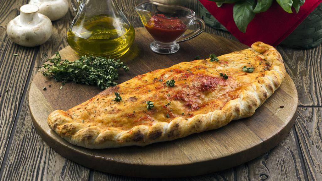 Mozzarella, Ricotta, Salami & Pepperoni Calzone · Our pizza dough, stuffed with salami, pepperoni and tons of mozzarella and ricotta cheese and baked to golden perfection.