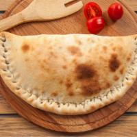 Vegetarian Special Calzone · Our pizza dough, stuffed with fresh spinach, mushrooms, onions, bell peppers, tomatoes, blac...