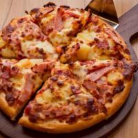 BBQ Chicken Hawaiian Pizza · Mouthwatering pizza made with BBQ chicken, sweet pineapples, fresh mushrooms and onions, wit...