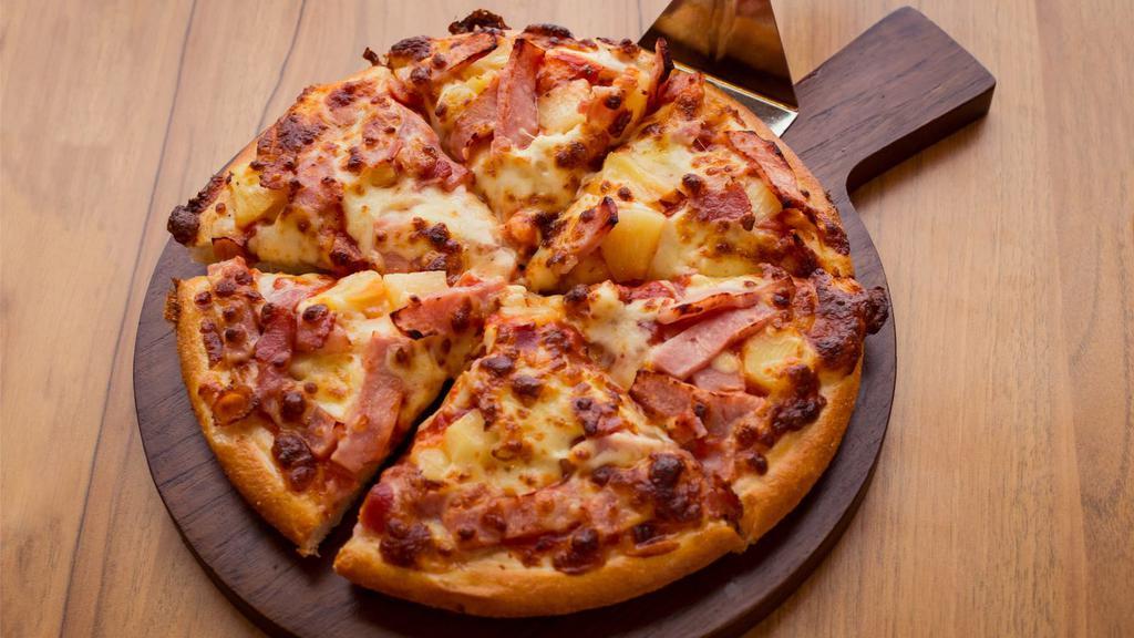 BBQ Chicken Hawaiian Pizza · Mouthwatering pizza made with BBQ chicken, sweet pineapples, fresh mushrooms and onions, with our pizza sauce or ranch.