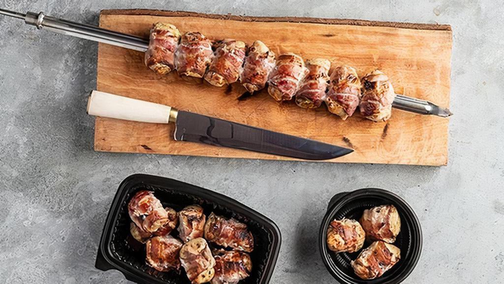 Chicken Wrapped In Bacon · Tender chicken breast wrapped in bacon
