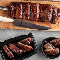 Barbecued Pork Ribs · Slow roasted pork ribs served with BBQ sauce