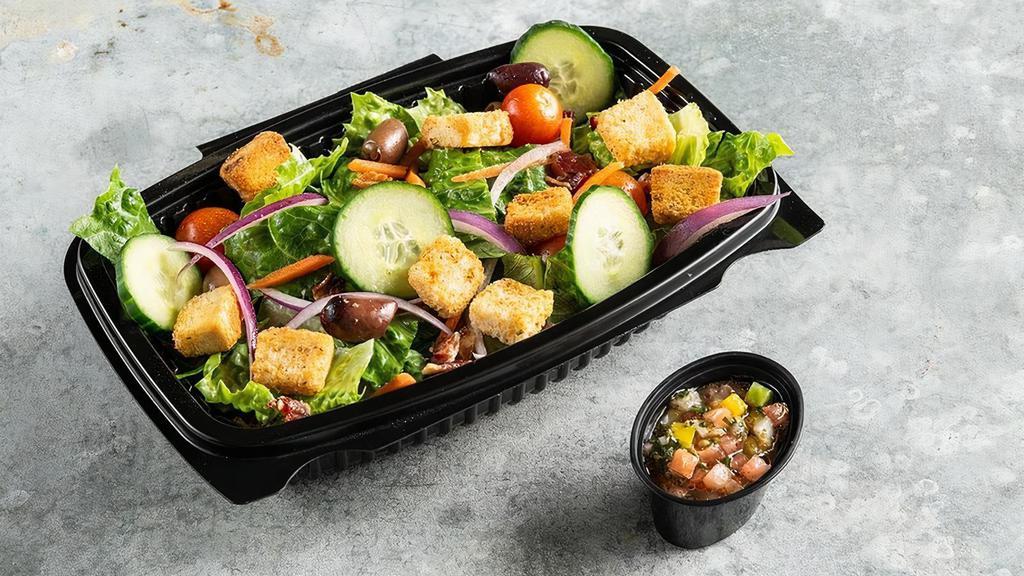 House Salad · Romaine Lettuce, Cucumber, Red Onion, Shredded Carrots, Cherry Tomatoes, Crispy Bacon, Croutons, Kalamata Olives and your choice of dressing