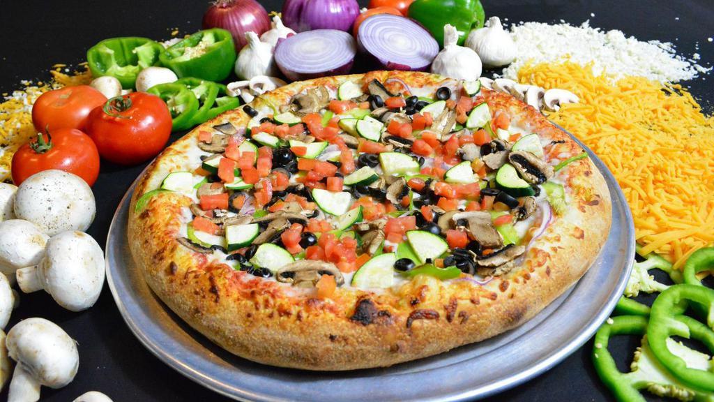 MAE WEST  (Veggie) · Red Onion, Bell Pepper, Tomatoes, Black Olives, Zucchini, & Mushrooms (Pineapple upon request).