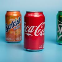 Soda Can (12 oz) · Coke, coke zero, or sprite.
