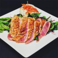 Seared Ahi · Blackening-spiced ahi, baby greens, carrots, toasted almonds, red onions, pickled ginger, cr...
