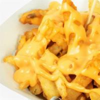 Cheese Fries · Crispy French fries drizzled with yummy cheese sauce.