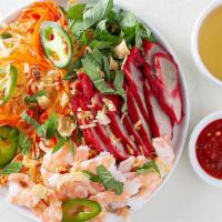 GỎI ĐU ĐỦ TÔM THỊT · shrimp and pork papaya salad garnished with basil and roasted peanuts